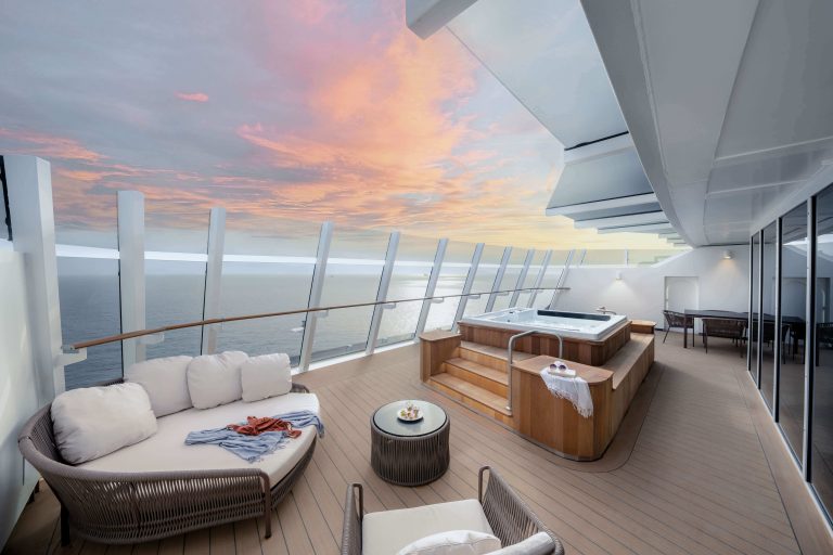 MSC Yacht Club Owner's Suite private balcony with whirlpool at sunset