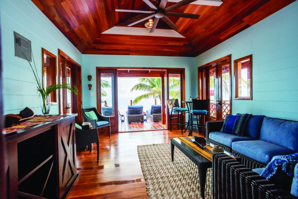 luxury beach villa interior with hardwood ceiling air conditioning and ocean view Belize