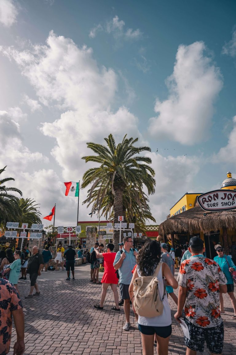 Cruise passengers at a busy port in Cozumel Mexico — knowing how cruise port scams work is the first step to avoiding them