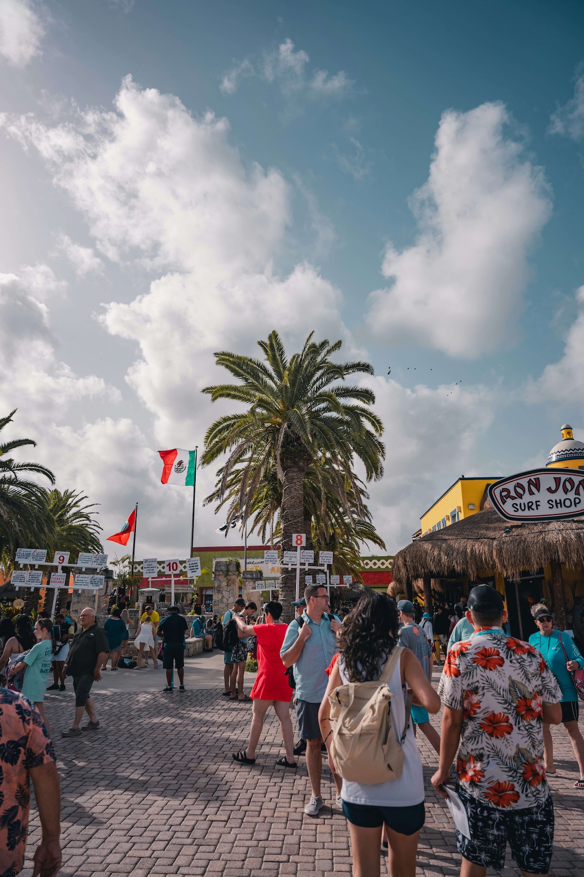 Cruise passengers at a busy port in Cozumel Mexico — knowing how cruise port scams work is the first step to avoiding them