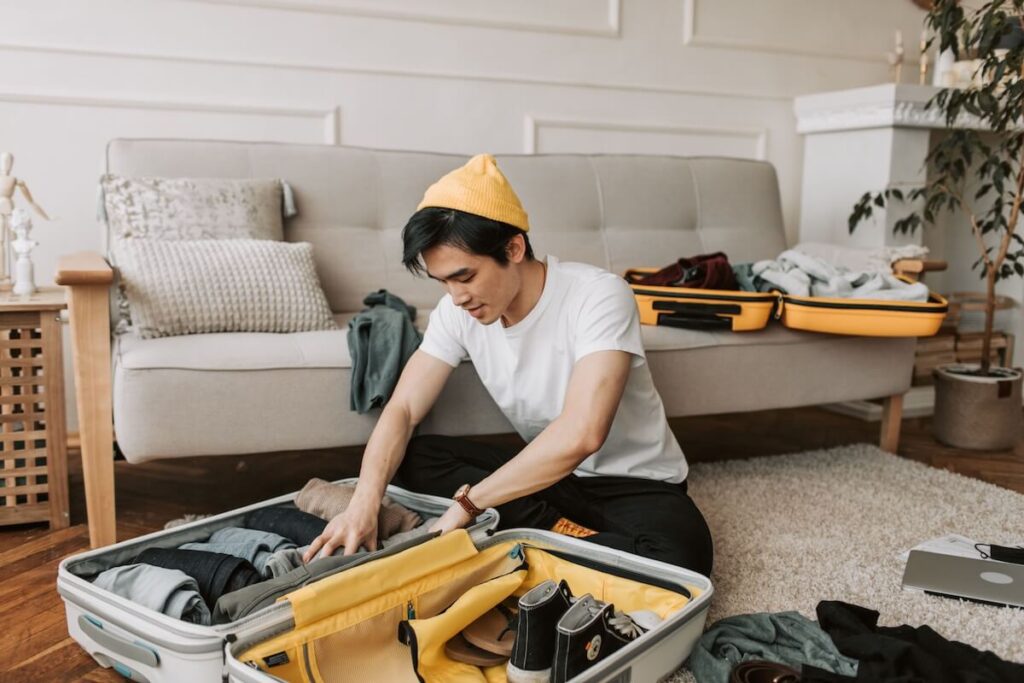 Packing a suitcase before a cruise — medication and travel essentials