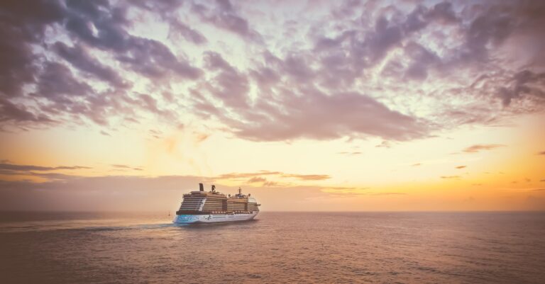 Cruise ship security overview — cruise ship sailing calmly at sunset