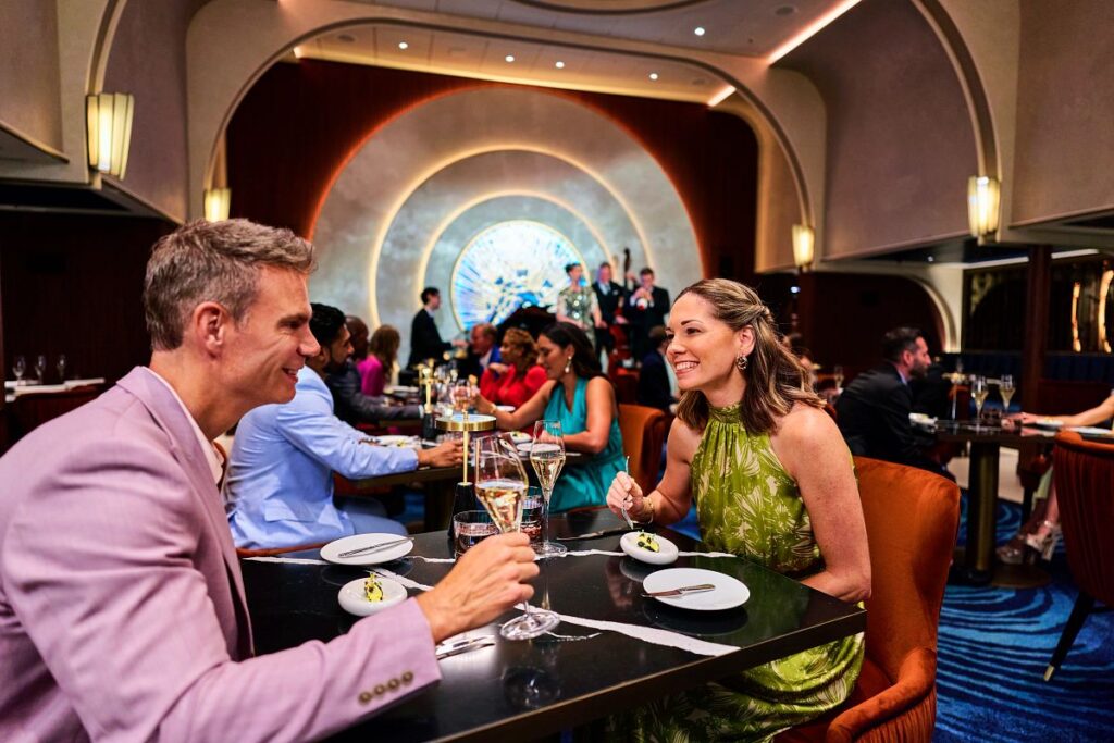 Couple enjoying a quiet table for two at a cruise ship restaurant