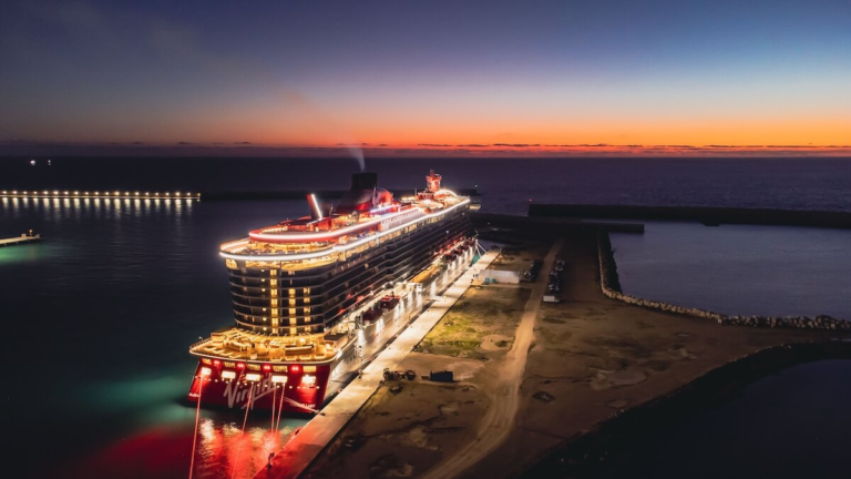 Aerial view of a cruise ship docked at harbor at sunset, how to prepare for a cruise