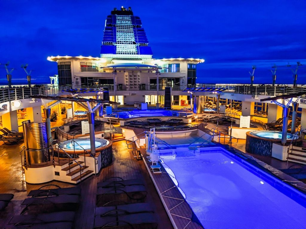 Cruise ship pool deck at twilight, the reward after trip preparation