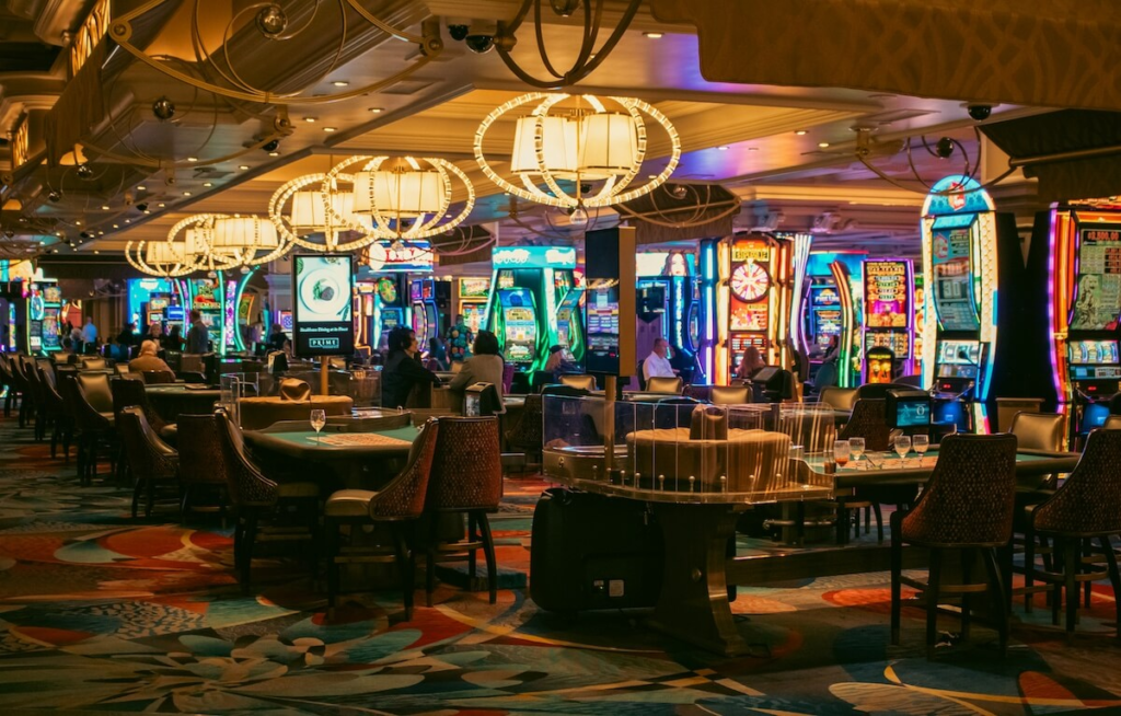 Cruise ship casino interior with slot machines and gaming tables